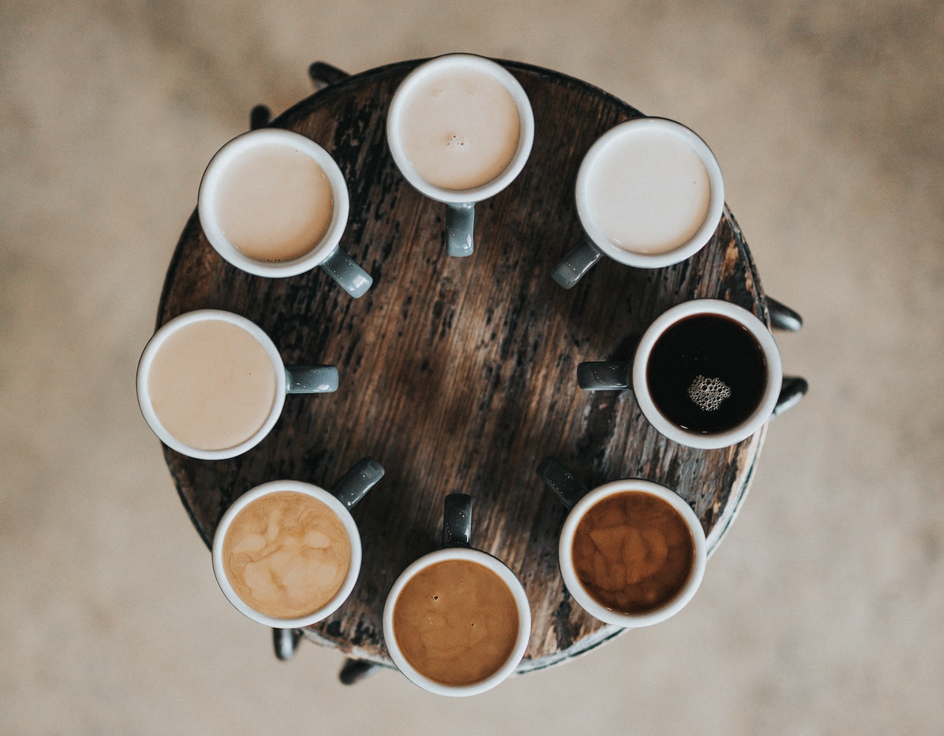 8 coffee cups in a circle suggesting choices